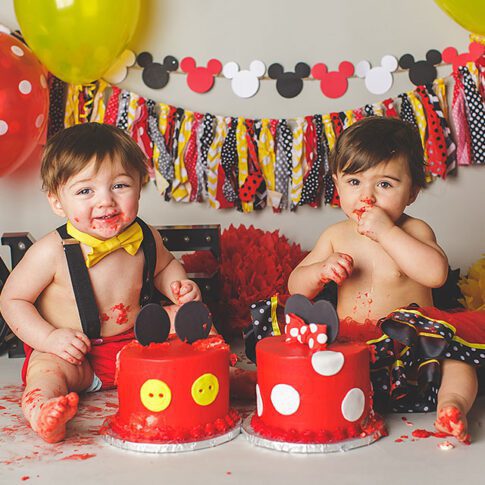 One year old twins with mickey mouse cake smash theme