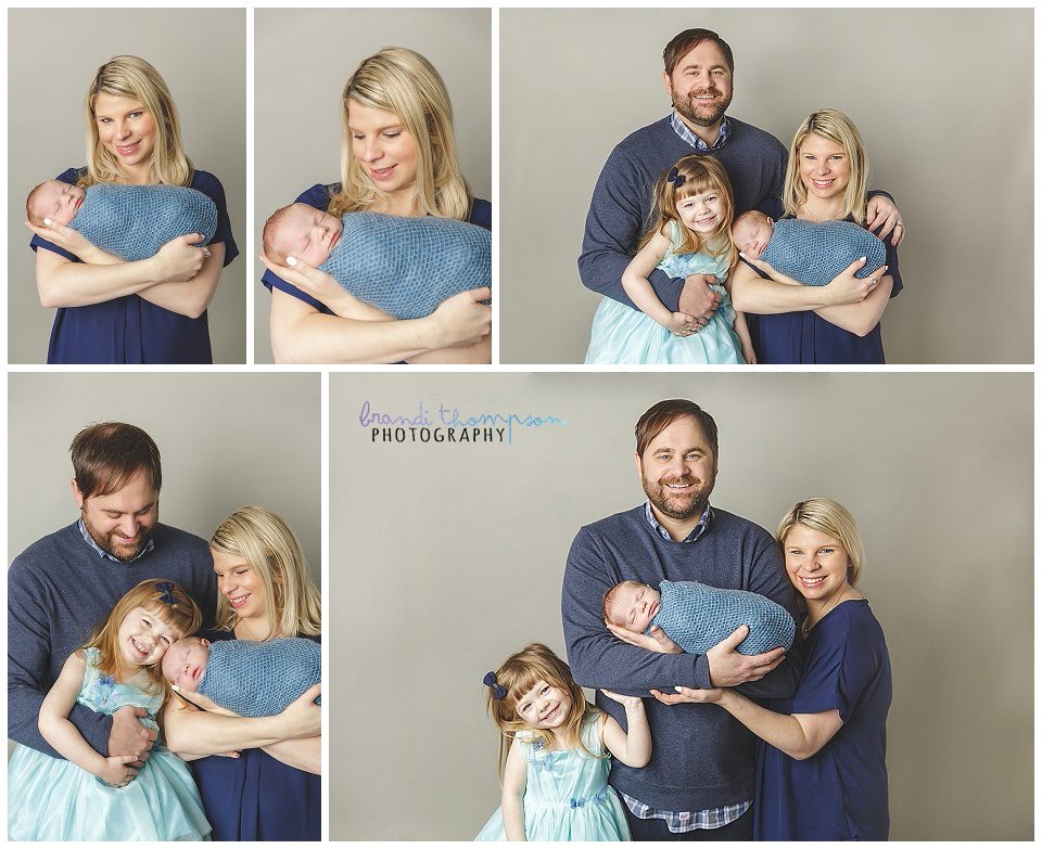 family photos in studio with newborn boy, 3 year old sister, and mom and dad, all wearing shades of blue, studio in plano, tx 