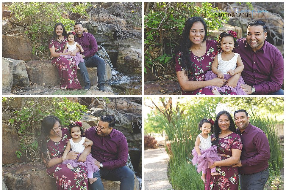 outdoor family photos in a park with a south asian family with mom, dad and baby girl. They are wearing shades of maroon and purple