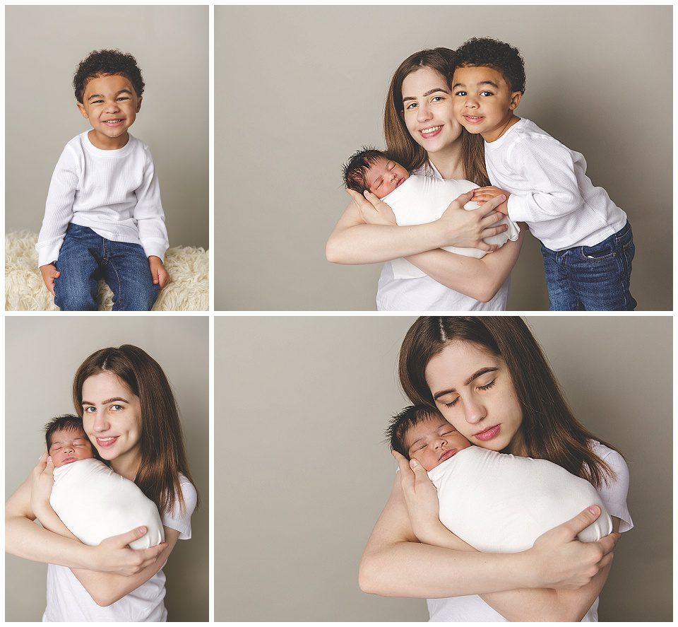 studio photos of a mother with light skin, and two darker skin children a preschool boy and newborn girl