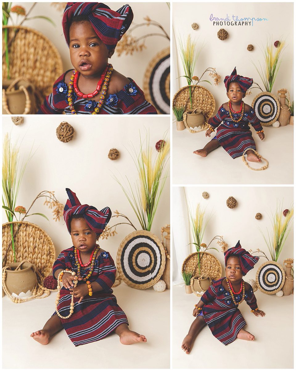 studio photos of a Black one year old in traditional African outfits with a neutral background