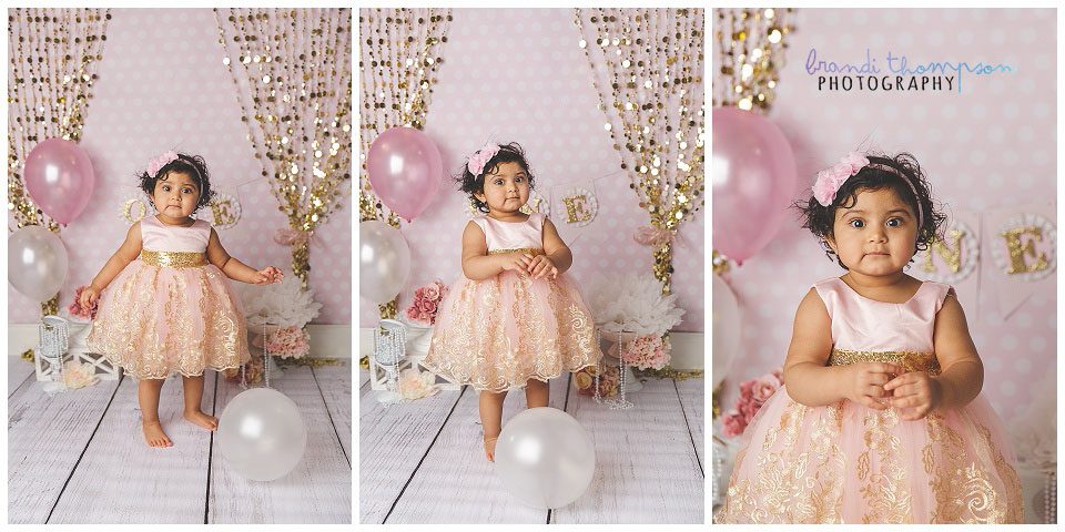 Collage of one year old medium brown skinned baby girl in shades of pink and white with a pink and gold set and pink cake